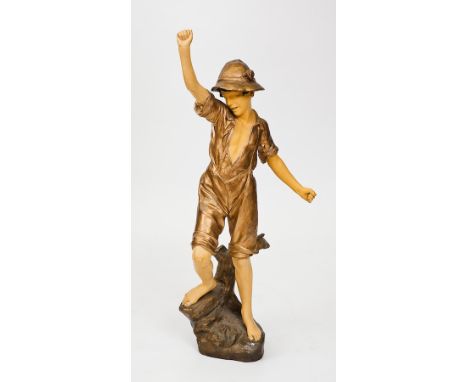 GOLDSCHEIDER FIGURE OF A FISHER BOY 
modelled with one arm raised and on a naturalistic base, impressed mark, signed 'Chere',