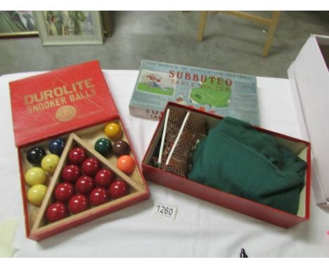 An early Subbuteo table soccer set with card figures and a set of Durolite snooker balls.