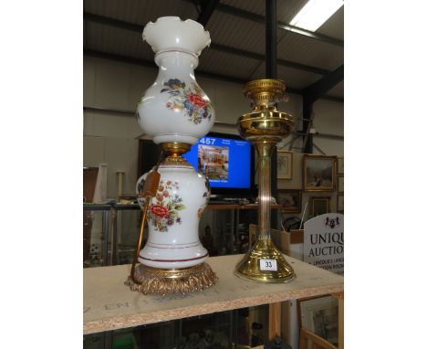 A brass oil lamp base and and a ceramic table lamp base.