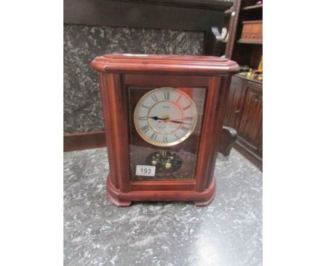 An Actim mantel clock.