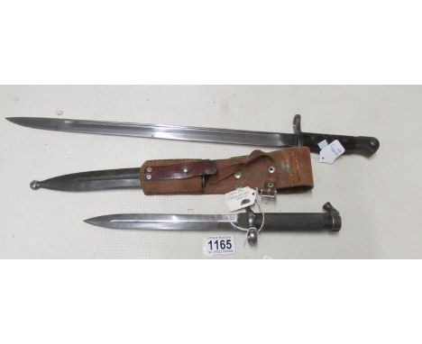 A U.S 1917 pattern sword bayonet and a Swedish 1896 pattern bayonet by Eskilstuna Iron Manufacturing Ltd., with scabbard and 