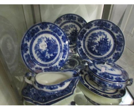 A mixed lot of blue and white including Doulton Burslem sauce tureen, ladle and stand, 3 plates etc.,