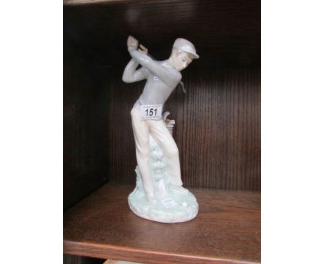 A NAO boy golfing figure.