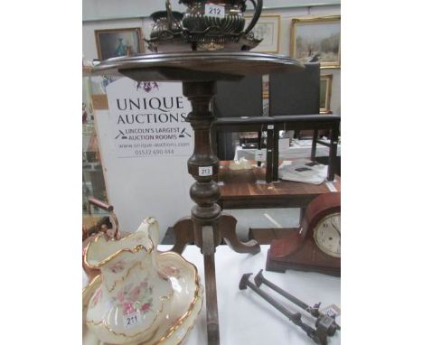 A mahogany tripod table (top a/f).