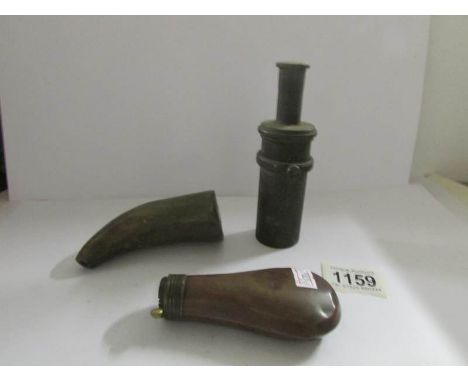 A 19th century copper powder flask, a horn powder flask and an early 20th century wick light (possibly WW1 trench light).