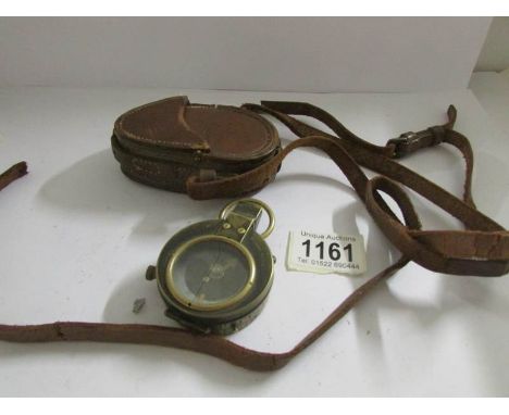 A Cruchon & Emons of London Verners pattern lacquered brass compass with M.D.P dial and ware department arrow marking complet