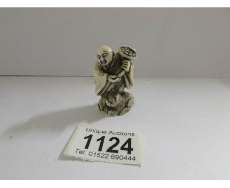 A 19th century ivory immortal netsuke.