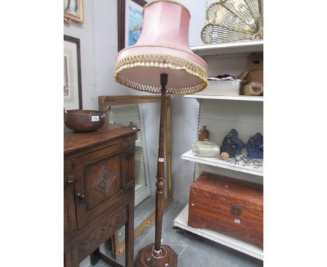 A standard lamp with shade.