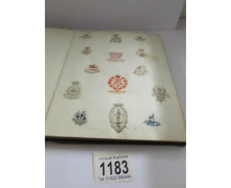 An album of assorted letter head crests including ships, army regiments, universities etc.,