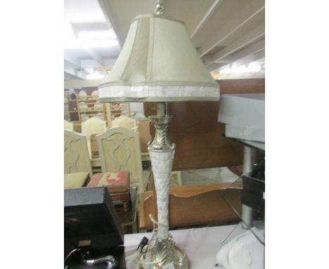 A good quality table lamp with shade.