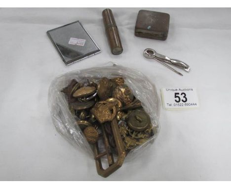 A quantity of military/R.A.F badges and buckles, miniature tools in cylinder, razor, pipe cleaner and stamp holder.