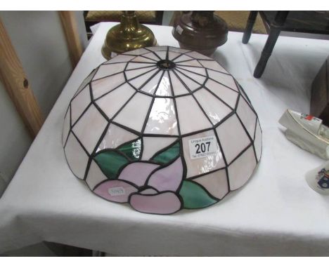 A Tiffany style lamp shade.