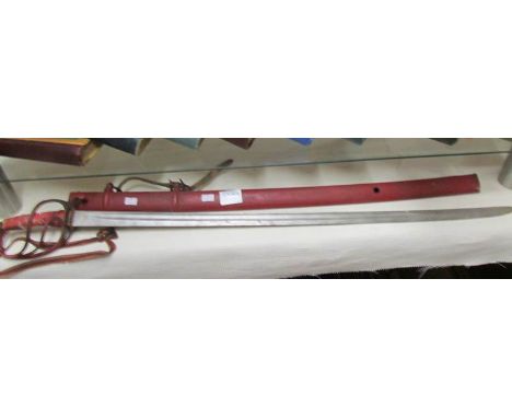 An old sword in scabbard.