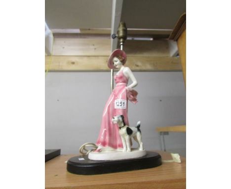An art deco style figure table lamp.