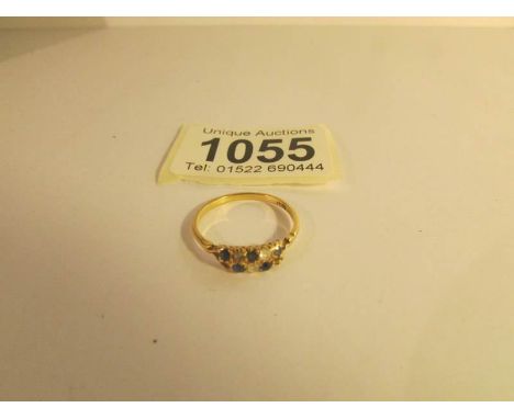 A 9ct gold diamond and sapphire ring, size P.