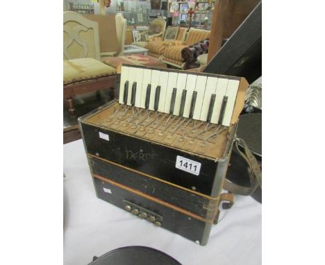 A vintage accordion, a/f.
