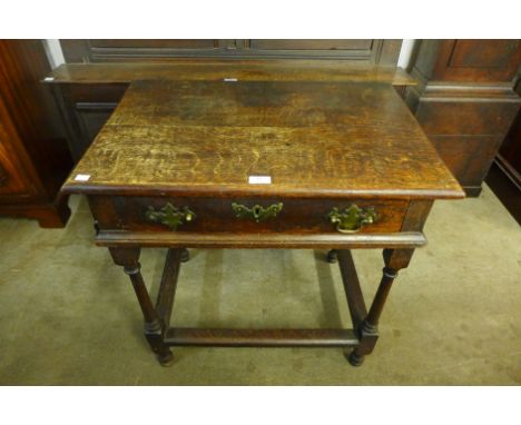 A George II joined oak single drawer side table