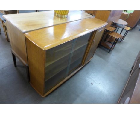 A Priory light oak bookcase