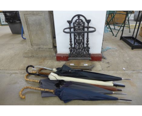 A cast metal stick stand and umbrellas