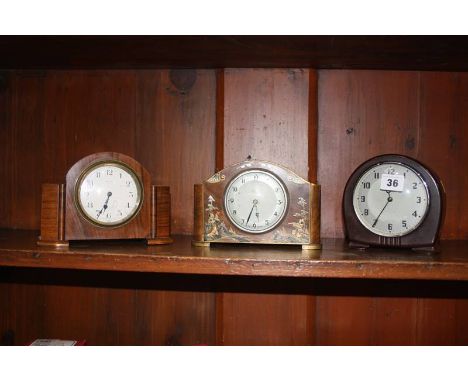 A chinoiserie mantle clock and two others