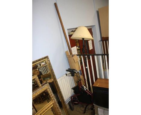 Lamp, walker and a parasol