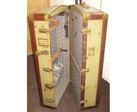 CABIN TRUNK, early 20th century green canvas with leather bindings and fitted interior, 102cm x 56cm x 32cm. 