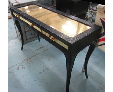 'KOKET' CONSOLE TABLE, in black velvet snakeskin pattern with brass coloured brushed metal top and three frieze drawers, 122c