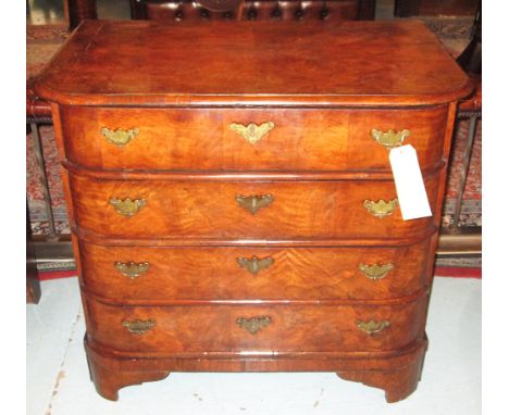 COMMODE, early 19th century Dutch, figured walnut, of D bow outline and four drawers, 83cm W x 53cm D x 72cm H.