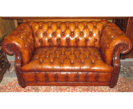 CHESTERFIELD SOFA, vintage tan brown leather of small proportions with deep button upholstered back, arms and seat, 152cm W. 