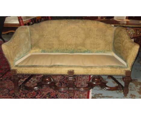 SOFA, late 19th century walnut in close nailed faded green plush on stretchered legs (seat cushion lacking) 151cm x 66cm x 84