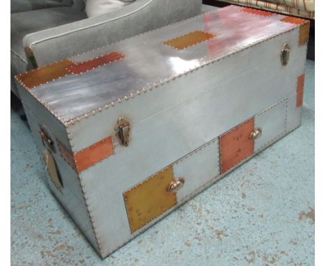 TRUNK, riveted metal patchwork design with a rising top over short drawers, 110cm L x 40cm W x 50cm H. 