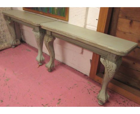 CONSOLE TABLES, a pair, Georgian style in a distressed gree painted finish, with cabriole shaped legs and claw and ball feet,