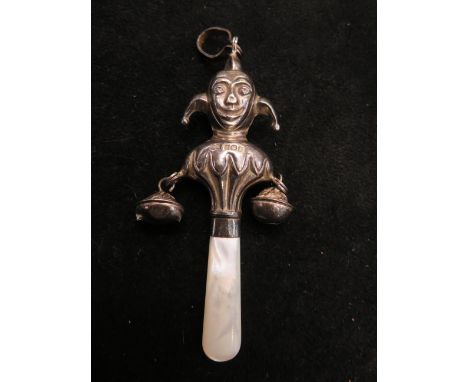 Baby's silver rattle in the form of a jester, with mother of pearl handle, full Birmingham hallmarks