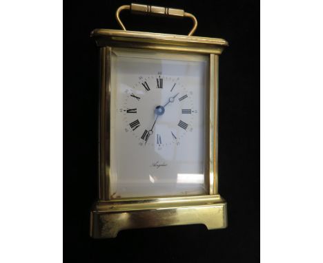 Heavy brass English carriage clock, Angelus. currently ticking