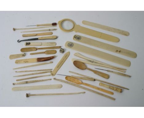 A small collection of ivory and bone sewing tools