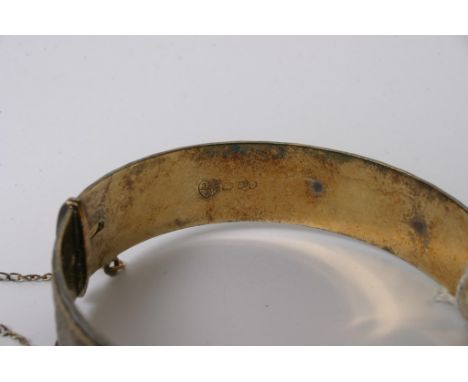 A solid silver bangle