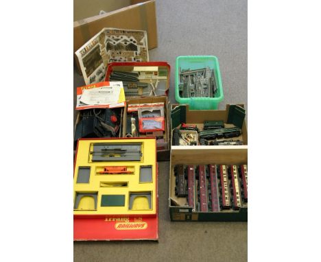 A collection of Hornby trains, track and accessories including a a boxed R161 operating Hopper car set, six unboxed locomotiv