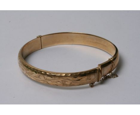 A 9ct gold bangle