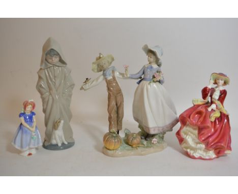 A boxed Lladro figural group of a girl and a scarecrow (a/f), a Nao figure of a boy and two Royal Doulton figures 'Top o' the