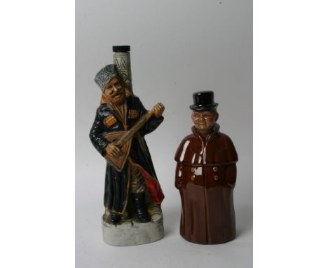 A Cortendorf German ceramic novelty decanter or liquor bottle in the form of a hotel doorman wearing a brown coat with the na