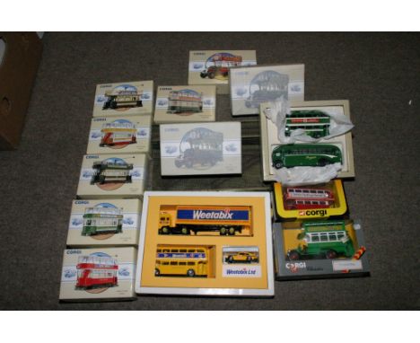 A collection of boxed Corgi buses and trams