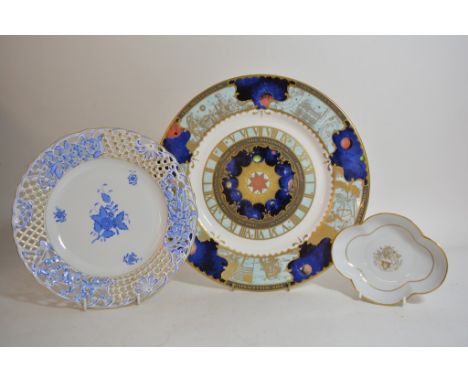 A Herend Hungarian porcelain pierced plate with hand painted blue floral decoration on a white ground together with a Royal W