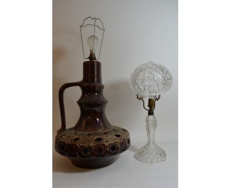 A cut crystal table lamp together with a retro German pottery table lamp.