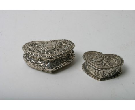 Two small silver heart shaped trinket boxes, both bearing Birmingham hallmarks