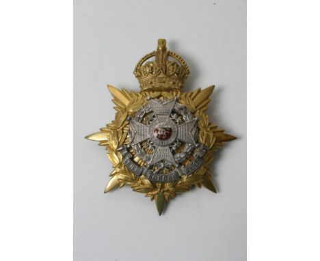 An officers blue cloth helmet plate of the border regiment Kings Crown, in near perfect condition