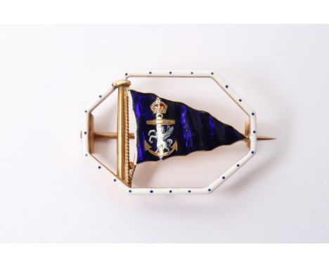 A rare 18ct gold and enamel Benzie of Cowes brooch in the form of a Royal blue flag with applied crest 