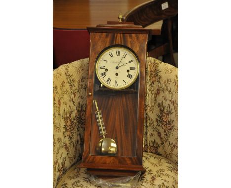 A Knight and Gibbons mahogany longcase clock, boxed with key and pendulum