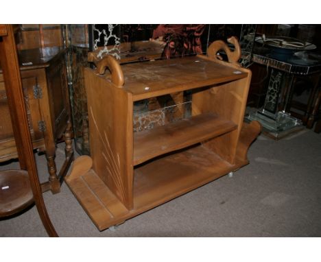 An elm storage unit on casters with carved figural decoration of stoats and birds in the manner of Robert 'Mouseman' Thompson