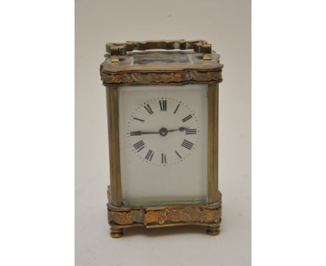 A brass cased carriage clock