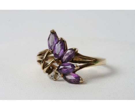 A 9ct gold amethyst and chip stone diamond ring 
